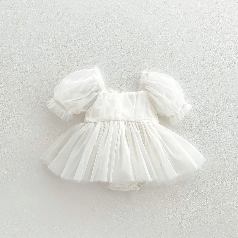 Dress your toddler in sweet style with this new baby lace dress featuring a big bowknot and short sleeves—perfect for special occasions! -