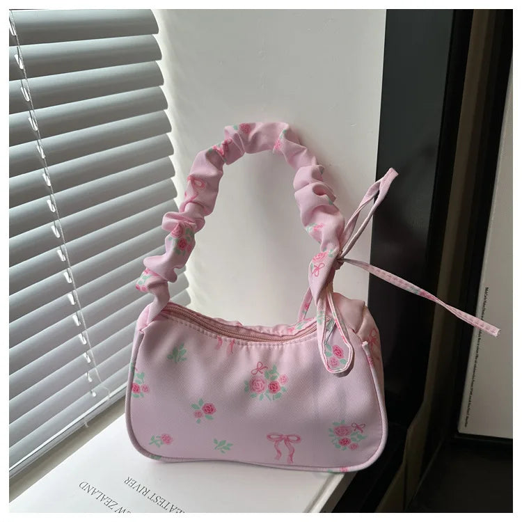 Stay stylish with these chic women's handbags made from nylon. Featuring a pleated design, these bags are perfect for the summer season, offering a trendy and functional accessory for your everyday outfits. -