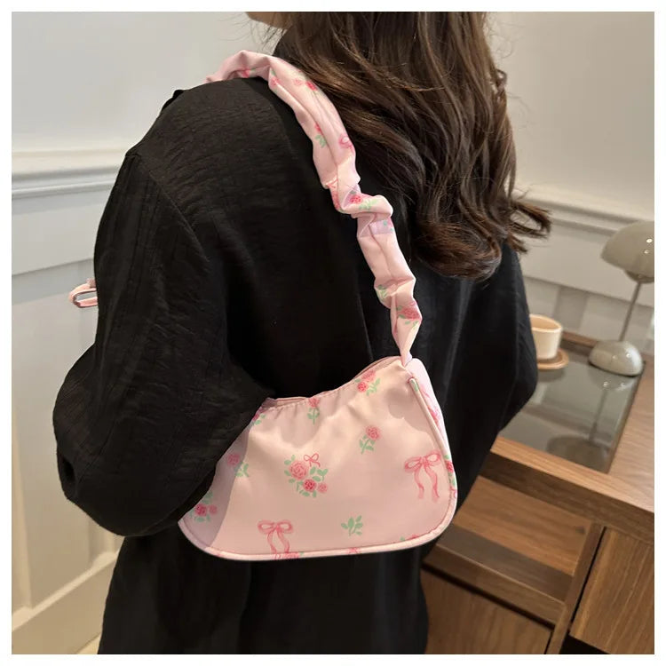Stay stylish with these chic women's handbags made from nylon. Featuring a pleated design, these bags are perfect for the summer season, offering a trendy and functional accessory for your everyday outfits. -