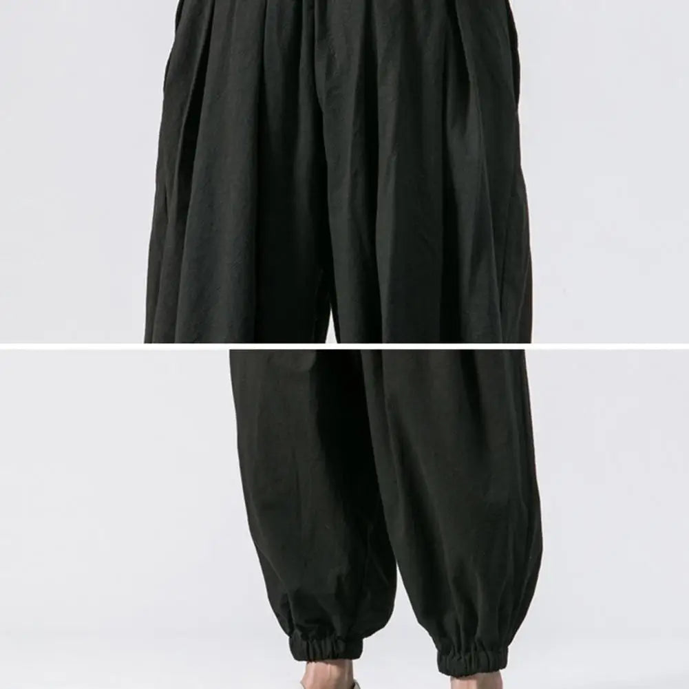 Stay comfortable and stylish in these men's baggy jogging pants featuring a drawstring waist—an ideal choice for a relaxed and casual look! -