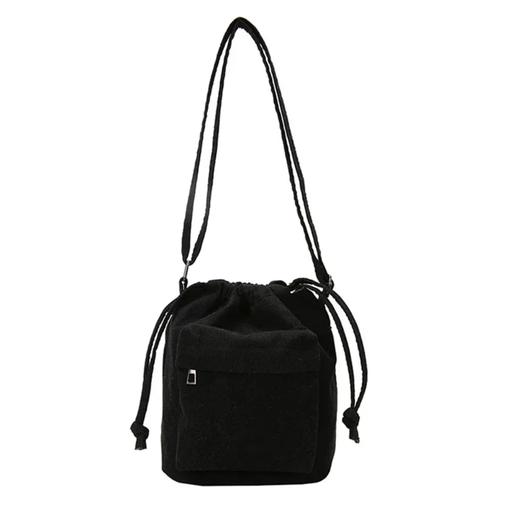 Carry your essentials in style with this cute middle shoulder drawstring bucket bag—a versatile and fashionable accessory for women on the go! -