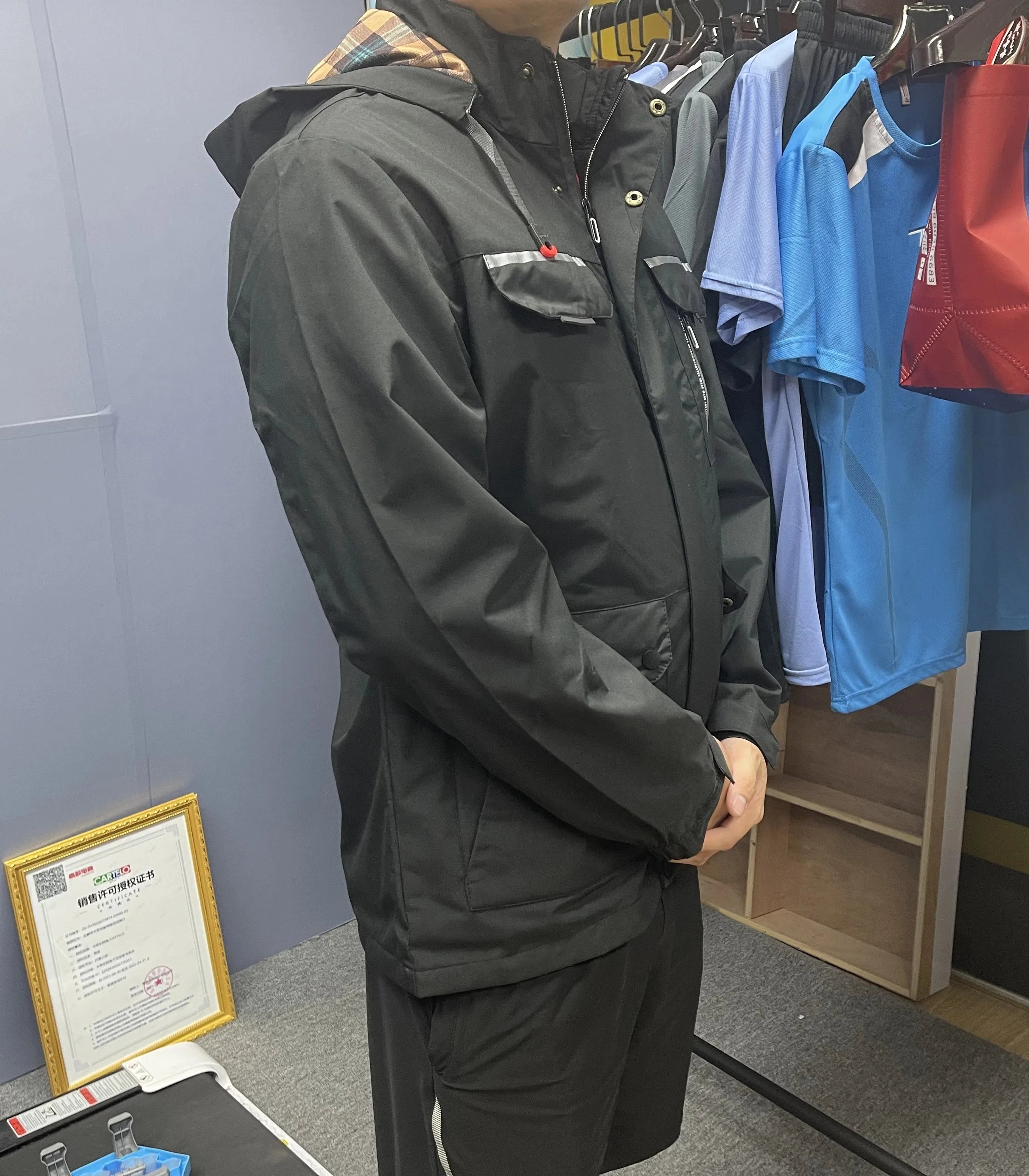 Stay protected from the elements with this men's windbreaker—a versatile and functional outerwear piece designed to keep you dry, windproof, and comfortable during outdoor activities. -
