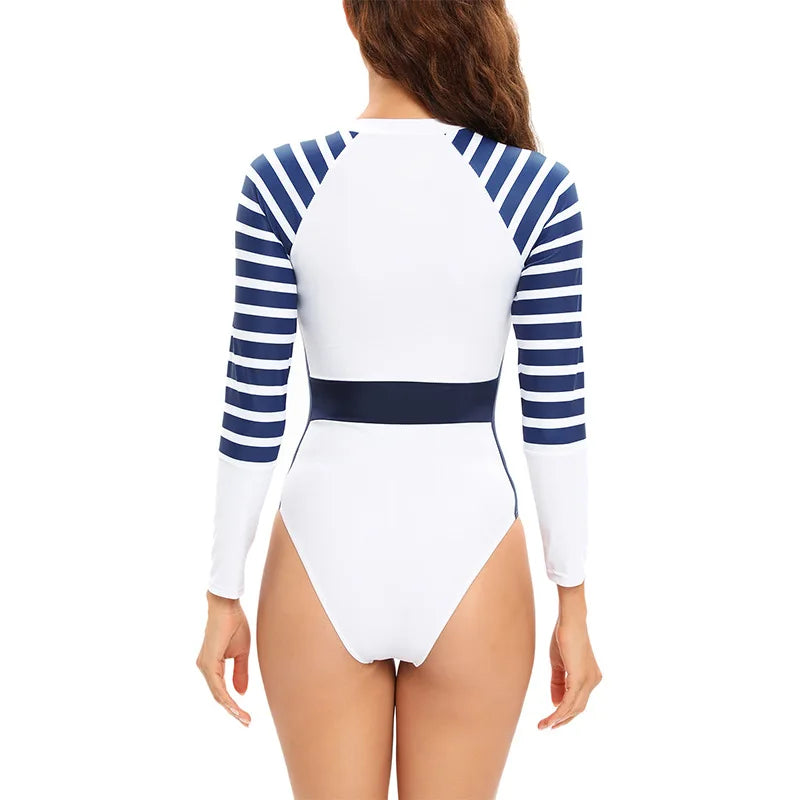 Stay stylish and protected from the sun in this long-sleeved one-piece swimwear for women! -
