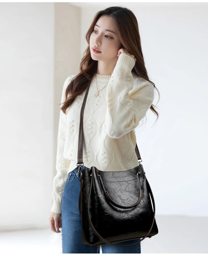 Elevate your style with these luxurious big shoulder bags for women. Designed by a top designer, these elegant handbags are the perfect accessory and can add a touch of sophistication to any ensemble. -