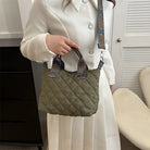 Elevate your style with these luxury designer shoulder crossbody bags for women. Featuring a quilted padded design from a top designer brand, these handbags are perfect for adding a touch of elegance to any outfit. -