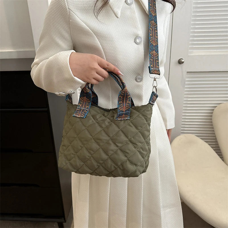 Elevate your style with these luxury designer shoulder crossbody bags for women. Featuring a quilted padded design from a top designer brand, these handbags are perfect for adding a touch of elegance to any outfit. -