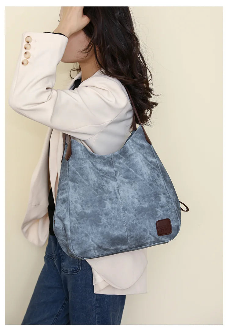 Stay organized and stylish with this large work tote bag for women. Designed with designer PU leather, this big bucket bag is perfect for carrying all your essentials in a chic and fashionable way. -