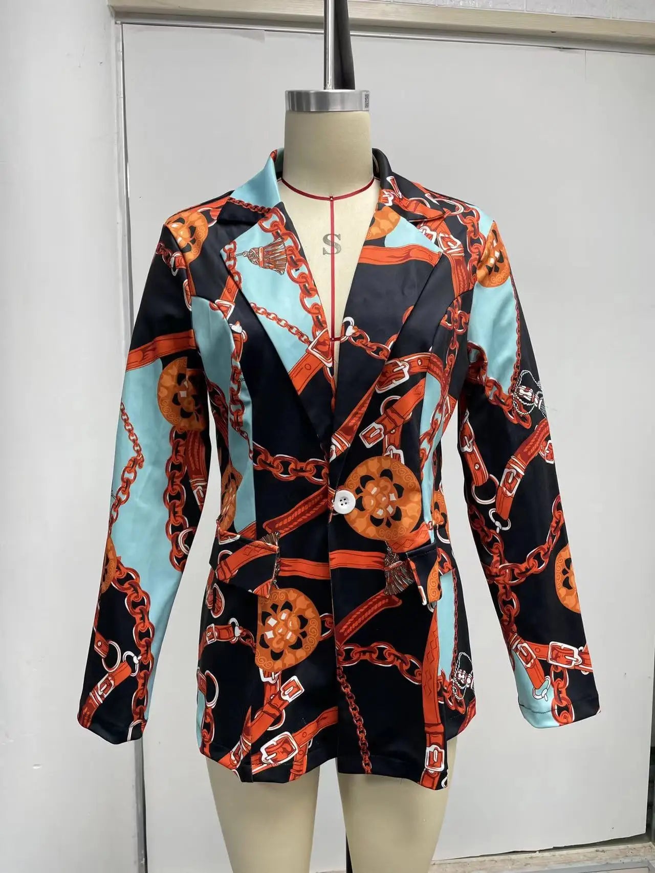 Turn heads in this fashionable and sexy suit jacket that’s all about bold style and confidence! -