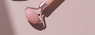 Enhance your skincare routine with this facial roller for the face, neck, and eyes. This resin massage tool can help improve circulation, reduce puffiness, and promote relaxation for a revitalized complexion. -