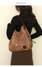 Stay organized and stylish with this large work tote bag for women. Designed with designer PU leather, this big bucket bag is perfect for carrying all your essentials in a chic and fashionable way. -