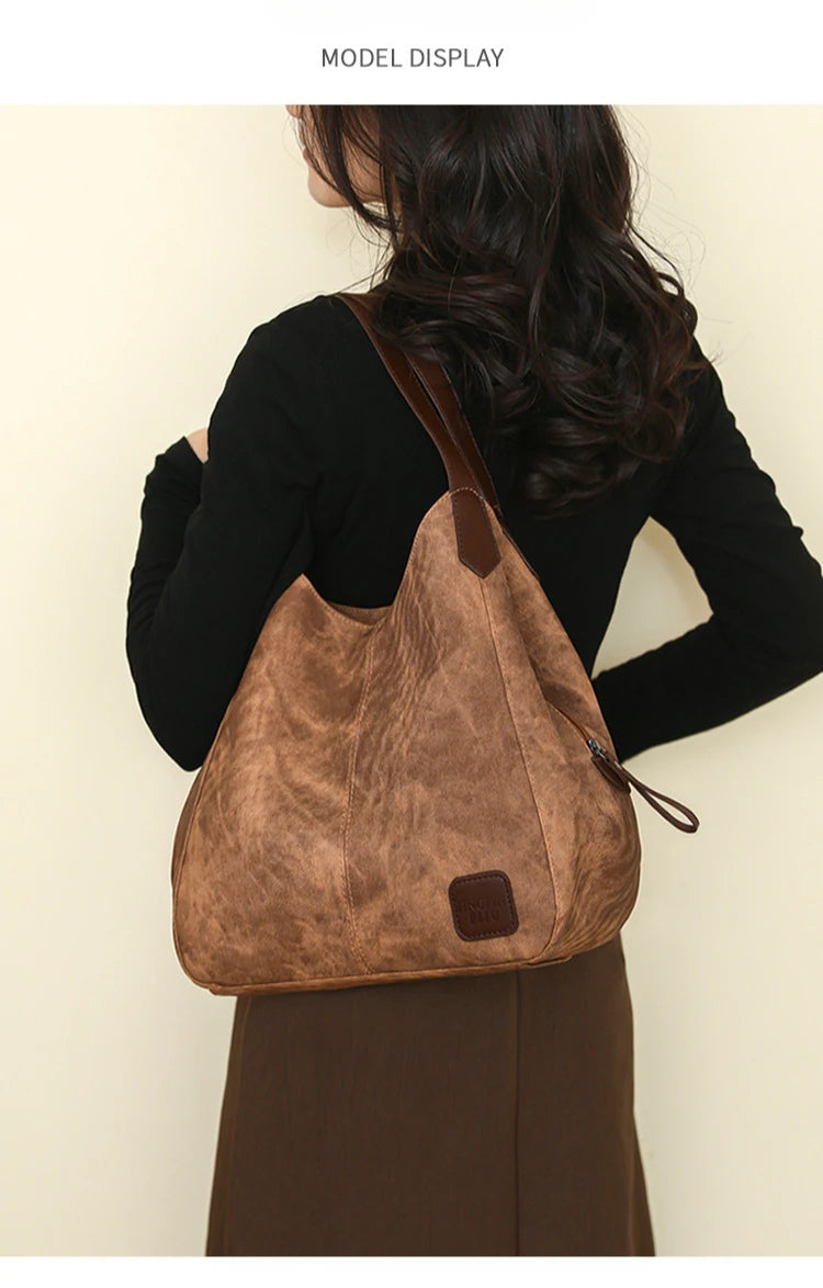 Stay organized and stylish with this large work tote bag for women. Designed with designer PU leather, this big bucket bag is perfect for carrying all your essentials in a chic and fashionable way. -
