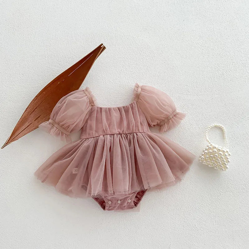 Dress your toddler in sweet style with this new baby lace dress featuring a big bowknot and short sleeves—perfect for special occasions! -