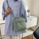 Carry your essentials in style with this cute middle shoulder drawstring bucket bag—a versatile and fashionable accessory for women on the go! -
