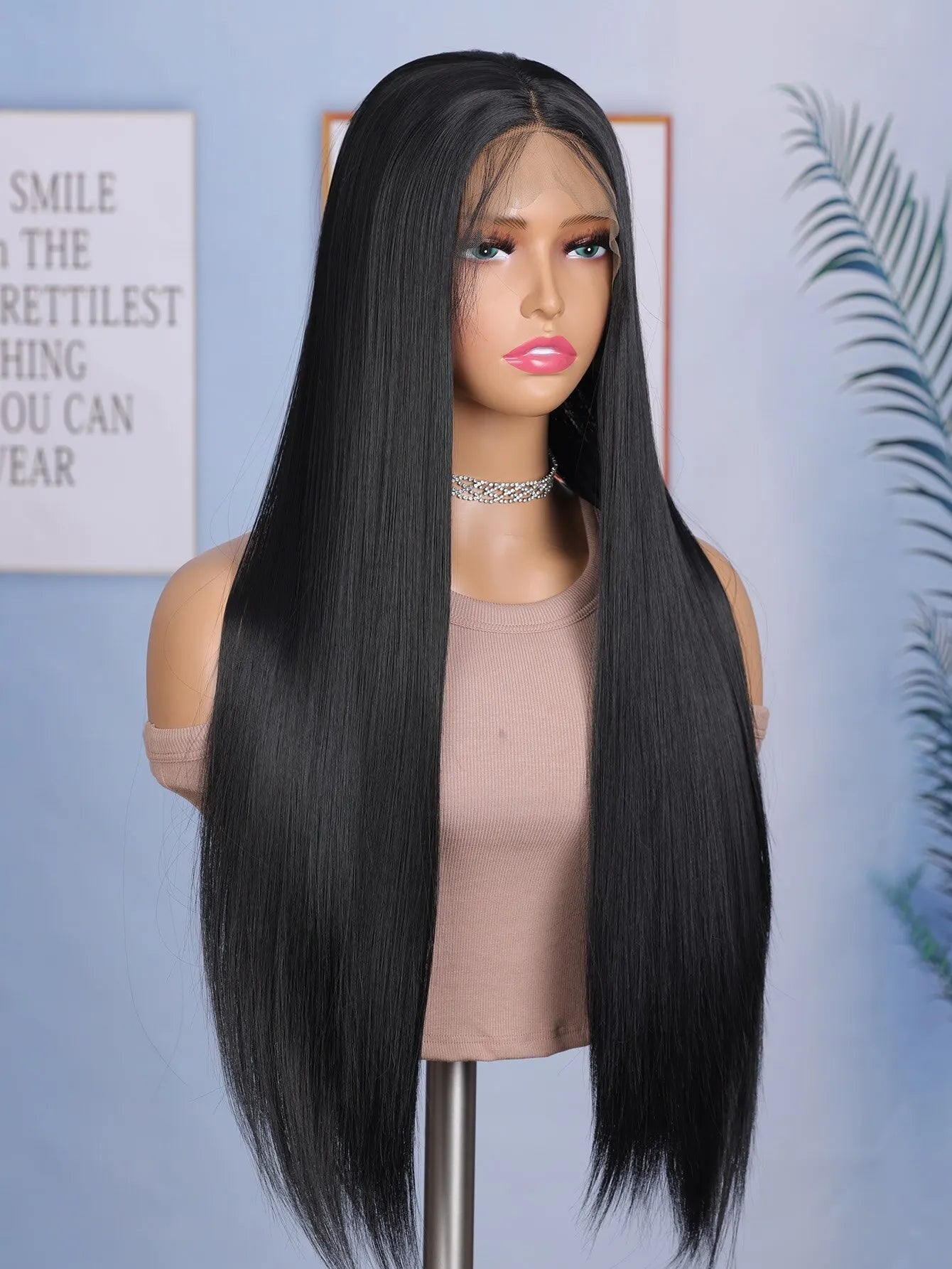 Enhance your style with this 24-inch straight lace front wig. Featuring a sleek black color, this wig is suitable for daily wear, providing a stylish and effortless look. -