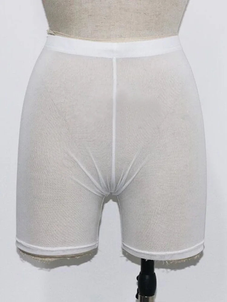 Stay stylish and comfortable with these yellow mesh transparent casual shorts for women—perfect for a fashionable and chic look! -