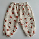Keep your little ones comfy and cute in these organic cotton loose-fit baby pants—featuring playful tiger, bear, and floral prints perfect for boys and girls! -