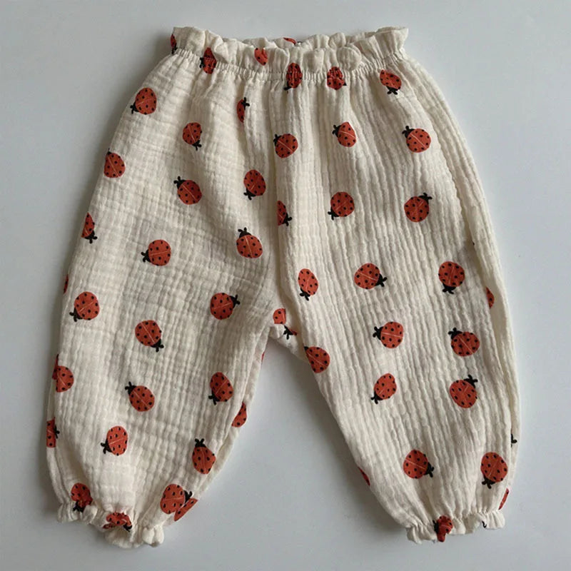 Keep your little ones comfy and cute in these organic cotton loose-fit baby pants—featuring playful tiger, bear, and floral prints perfect for boys and girls! -