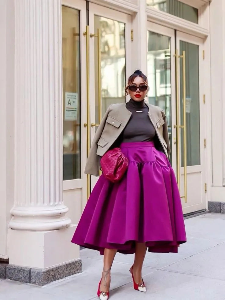 Combine elegance and practicality with these mid-calf satin women's skirts featuring handy pockets! -