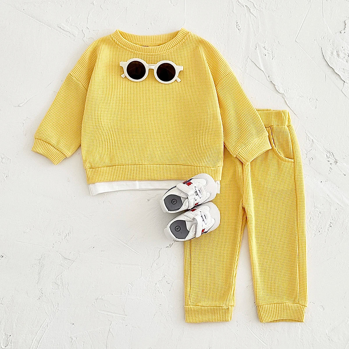 Dress your little one in comfort with this new baby clothes set—featuring a loose waffle cotton tracksuit perfect for kids on the move 0-3 Years Old -