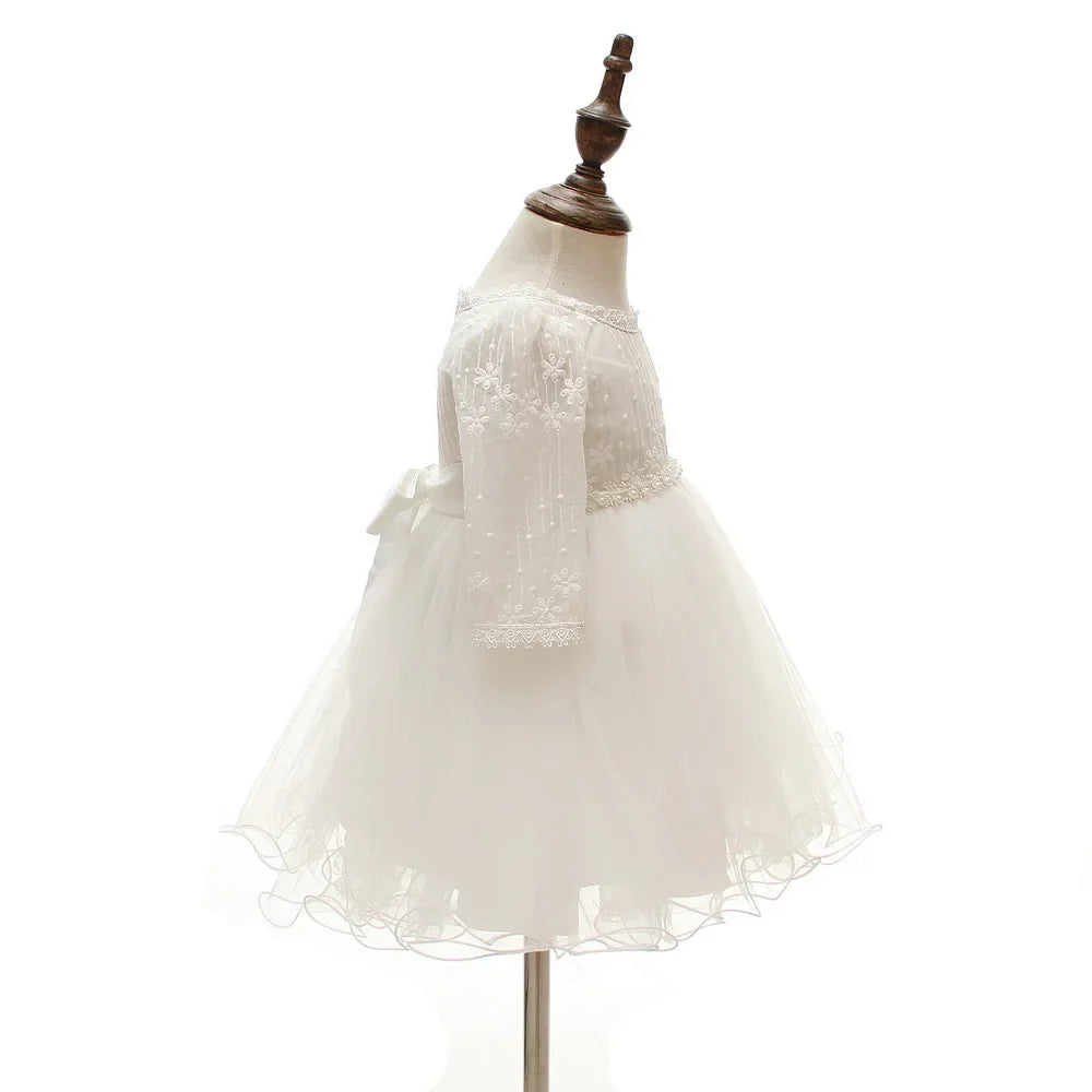 Make your baby girl shine in this elegant long-sleeve white party dress—perfect for special occasions! -