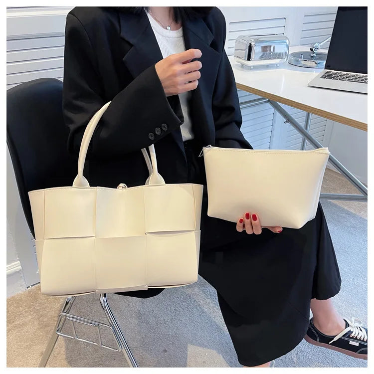Make a fashion statement with this large capacity handbag. Crafted with stylish woven leather, this tote bag is perfect for adding a touch of elegance to your everyday outfit. -
