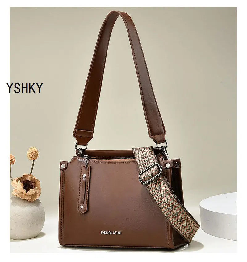 Elevate your style with this luxury designer crossbody bag for women, featuring a fashionable and chic color. Perfect for adding a touch of sophistication to your ensemble! -