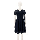 Make a chic statement with this elegant women's dress featuring an O-neck design, transparent lace, and hollow detail—a perfect choice for a sophisticated and stylish look. -
