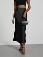 Elevate your elegance with this sleek black satin skirt for women—perfect for any occasion! -