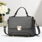 Carry all your essentials in style with this large capacity woman's handbag. Featuring both shoulder bag and crossbody options, this versatile accessory is perfect for everyday use and can accommodate your belongings with ease. -