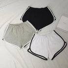 Stay comfortable and stylish with these elastic shorts for women. With a loose fit and quick-drying fabric, these shorts are perfect for active days or lounging at home. -