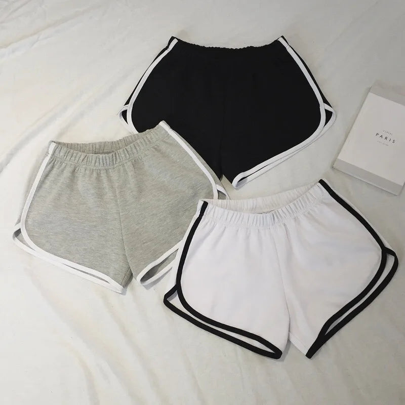 Stay comfortable and stylish with these elastic shorts for women. With a loose fit and quick-drying fabric, these shorts are perfect for active days or lounging at home. -