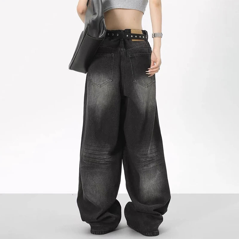 Rock a vintage vibe with these oversized retro black wide-leg jeans for women! -
