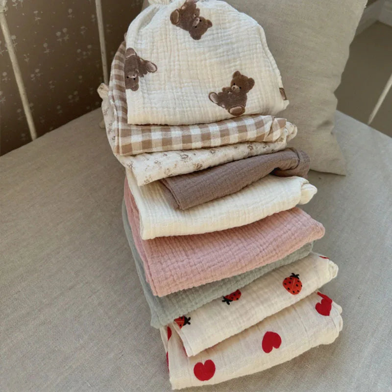 Keep your little ones comfy and cute in these organic cotton loose-fit baby pants—featuring playful tiger, bear, and floral prints perfect for boys and girls! -