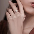 Sparkle bright with this women's one-carat silver moissanite ring! -