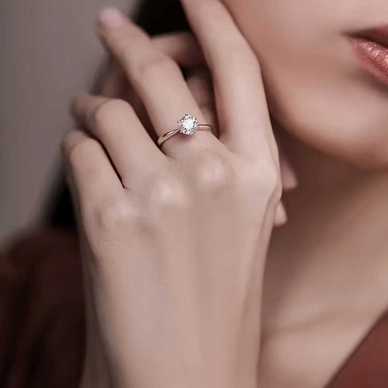 Sparkle bright with this women's one-carat silver moissanite ring! -