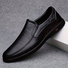 Step into comfort and safety with these men's genuine leather slip-on, slip-resistant shoes! -