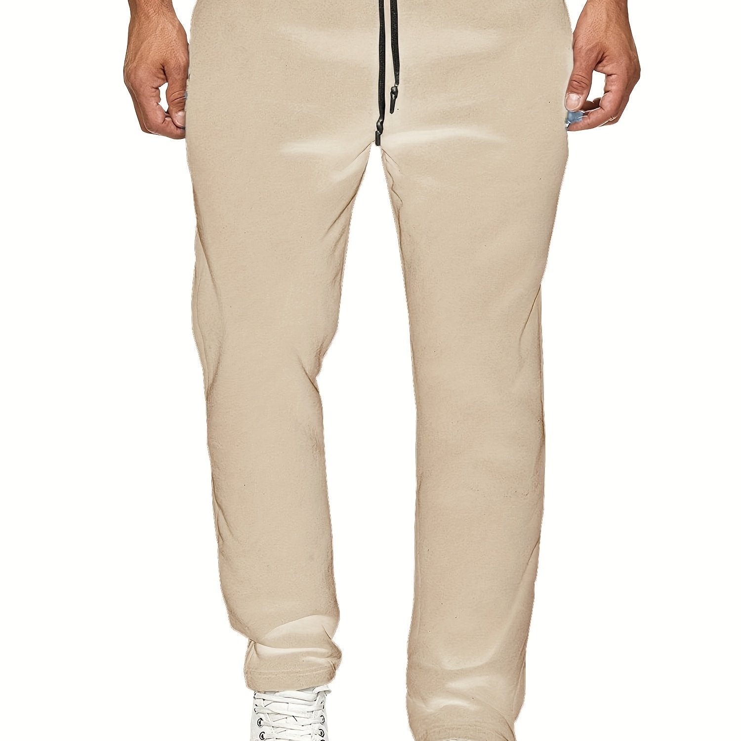 Stay comfy and warm in these men's solid color fleece-lined joggers! -
