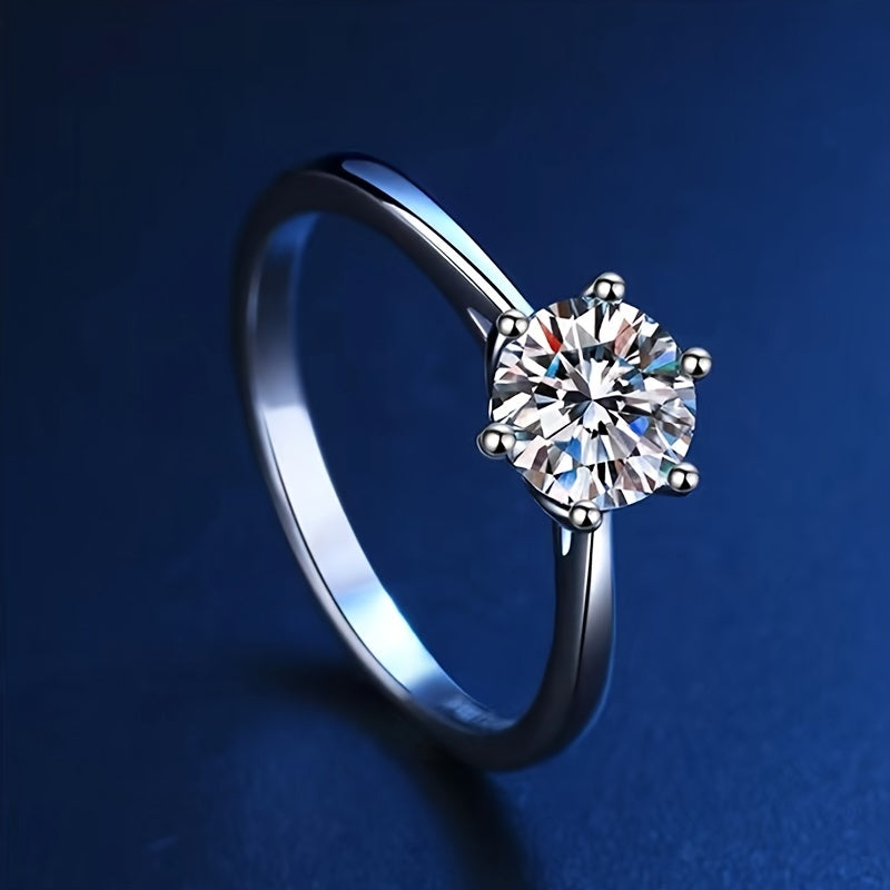 Sparkle bright with this women's one-carat silver moissanite ring! -