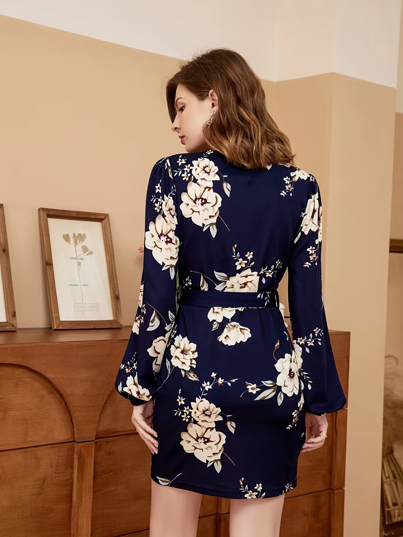 Rock an elegant look in this V-neck belted dress with a stylish floral print! -