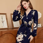 Rock an elegant look in this V-neck belted dress with a stylish floral print! -