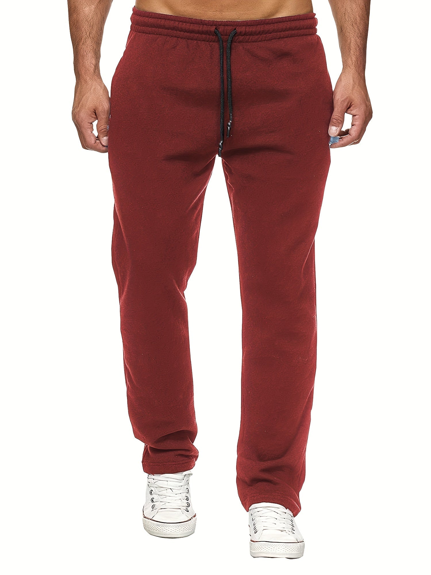 Stay comfy and warm in these men's solid color fleece-lined joggers! -