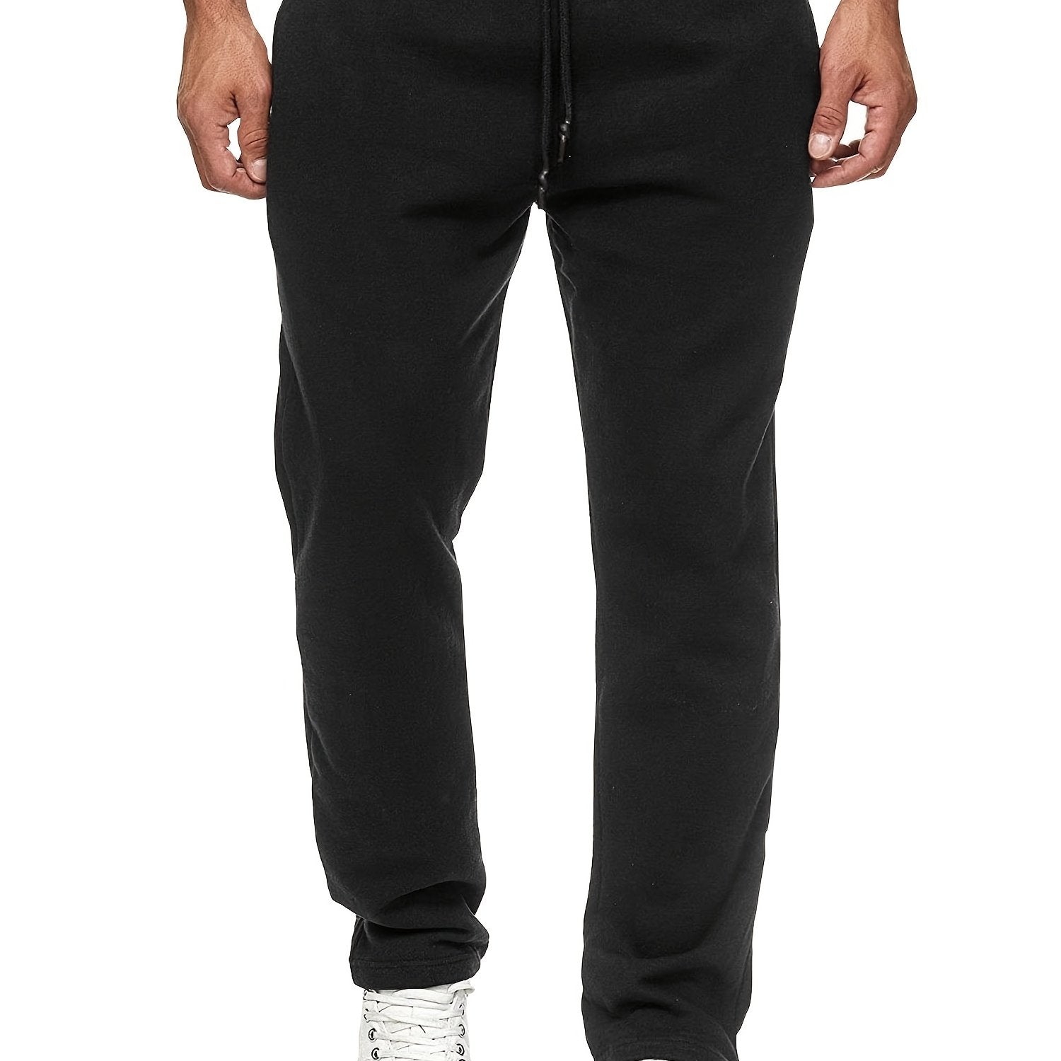 Stay comfy and warm in these men's solid color fleece-lined joggers! -