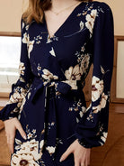 Rock an elegant look in this V-neck belted dress with a stylish floral print! -